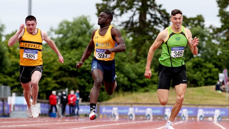 Israel Olatunde of UCD AC wins the 100m ahead of Stephen Gafney. Photograph: Bryan Keane/Inpho