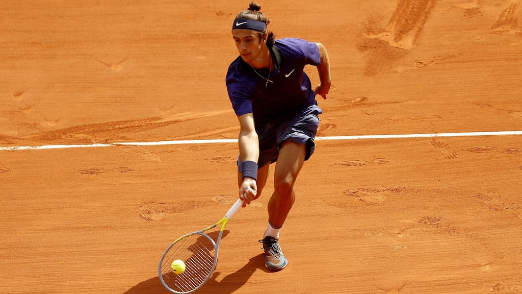 Italy’s Lorenzo Musetti in action during the fourth-round match against Novak Djokovic of Serbia at the French Open. Photograph: Ian Langsdon/EPA