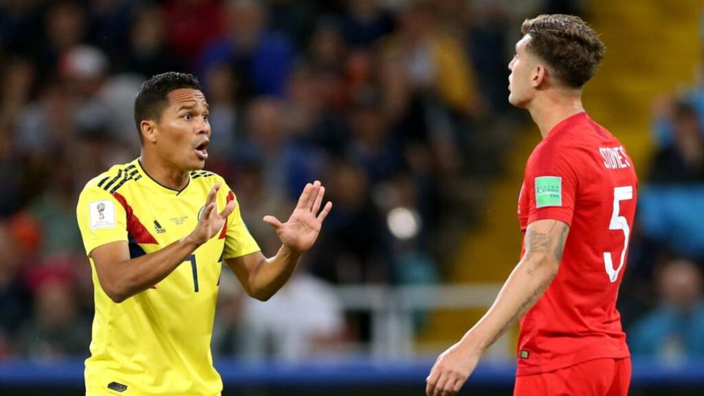 England defender John Stones has words with Carlos Bacca after the Colombia player received a yellow card in the round of 16 World Cup match at the Spartak Stadium in Moscow. Photograph: Tim Goode/PA Wire
