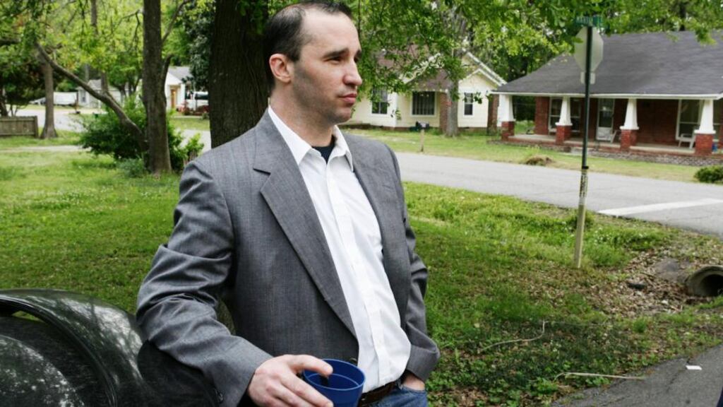 Everett Dutschke waits for federal authorities to search his home in Tupelo, Mississippi, earlier this week. Photograph: Thomas Wells/Daily Journal/Reuters