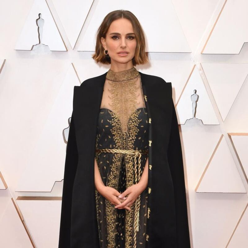 Portman was labelled a ‘fraud’ for wearing the cape. Photograph: Robyn Beck/AFP via Getty