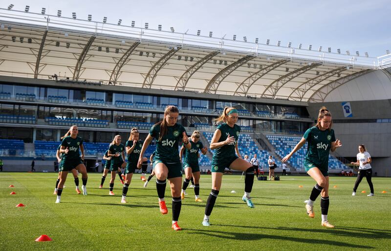 Tyler Toland, Hayley Nolan and Heather Payne go through their paces at the Ireland training session in Budapest on Monday. Photograph: Ryan Byrne/Inpho