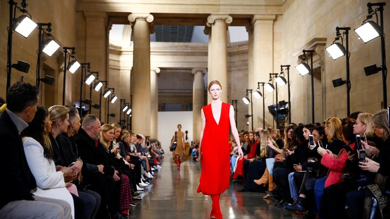 Models present creations at the Victoria Beckham show during London Fashion Week. Photograph: Henry Nicholls/Reuters