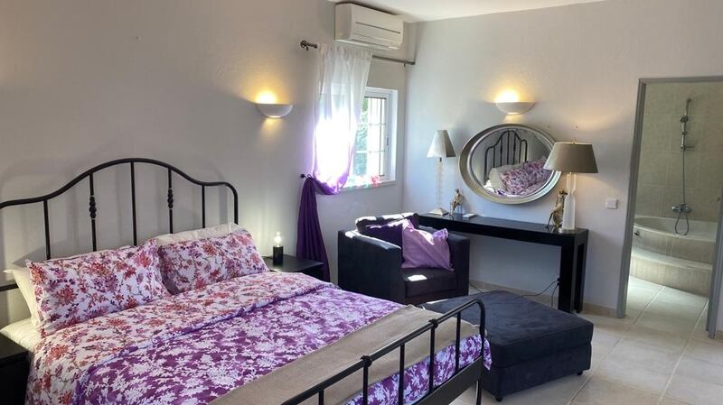 A bedroom in the home of Anne D’Avilez and her partner, Rob Brading, in Portugal.