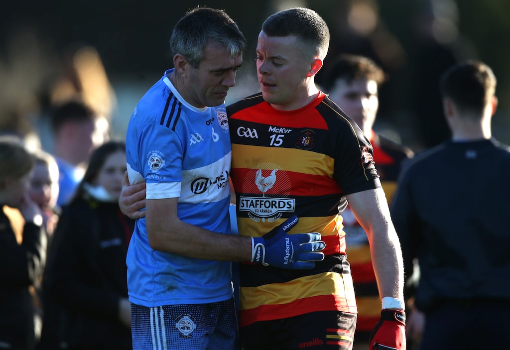 Aidan Nugent consoles Allenwood veteran Johnny Doyle after Cullyhanna's 1-11 to 0-11 victory in the All-Ireland IFC semi-final at Páirc Tailteann, Navan. Photograph: Leah Scholes/Inpho