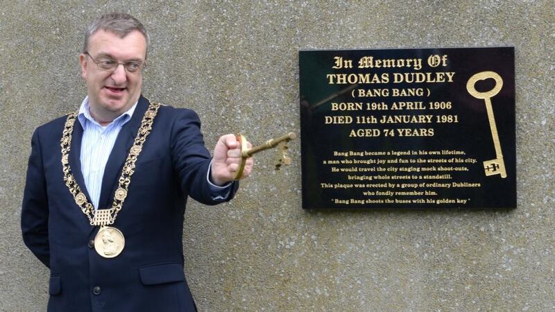 Lord Mayor of Dublin Micheál Mac Donncha imitates Bang Bang at the unveiling of a memorial in his honour. Photograph: Dara Mac Dónaill