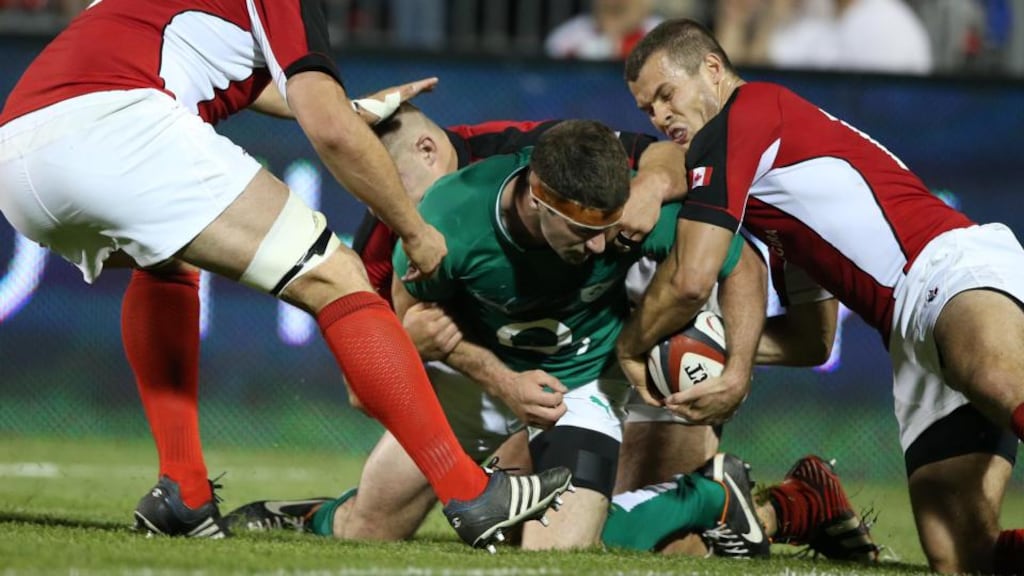 Ireland’s Fergus McFadden scores one of his three tries against Canada. Photograph: Billy Stickland/Inpho