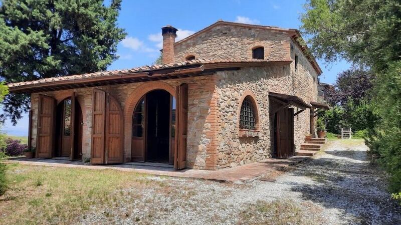 Four bedroom renovated farmhouse on 4.5 acres in the village of Chianni, Tuscany
