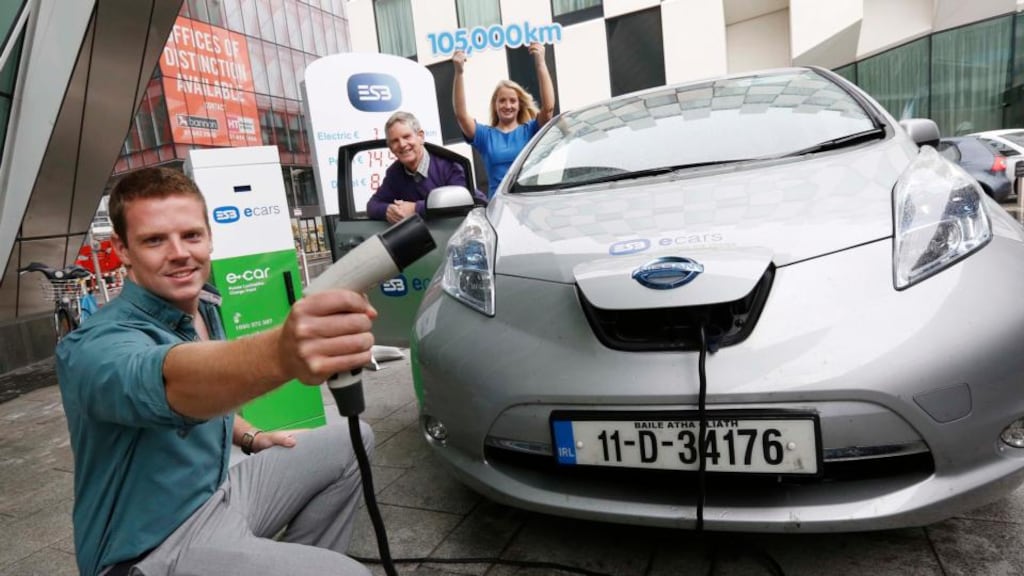 Daniel Mortell (left) from Limerick with Seán Clancy, Moycullen, Co Galway and Beatrice Whelan, from Monasterevin, Co Kildare, pictured celebrating the end of the ‘Great Electric Drive’ during which 105,000km was covered.
