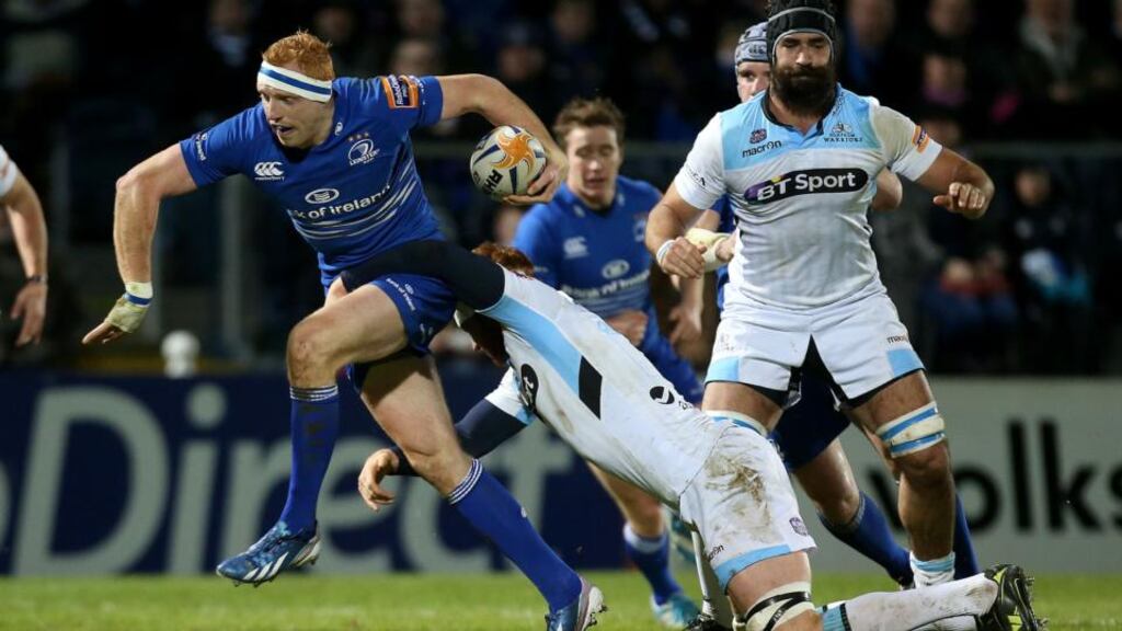 Leinster’s Darragh Fanning escapes a tackle from and Rob Harley of Glasgow Warriors. Photo: Ryan Byrne/Inpho