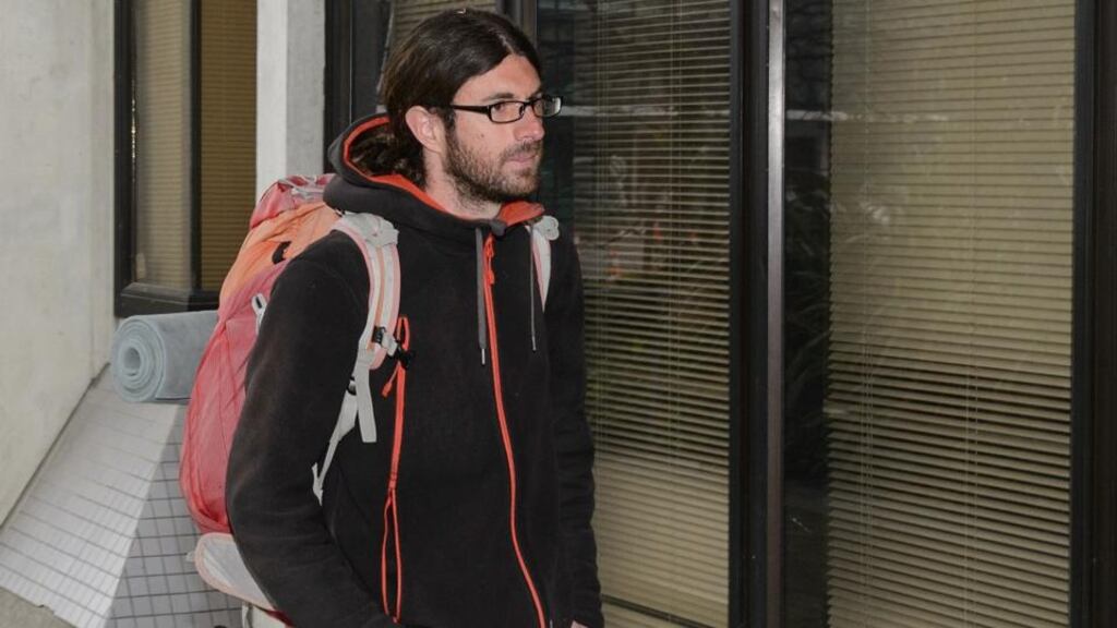 French tourist Cedric Claude Rene Rault-Verpre arriving at Christchurch district court on Friday, where he pleaded guilty to wilful damage after attacking a road sign in the tiny west coast settlement of Punakaiki. Leaving the courthouse he described New Zealand as “Nazi Zealand” to reporters. Photograph: Kai Schwoerer/Getty Images