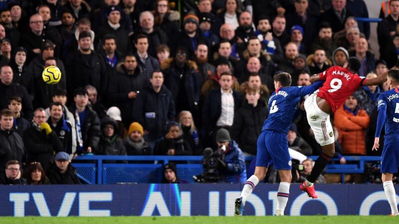 Anthony Martial of Manchester United scores the opening goal of the game during their Premier League encounter with Chelsea at Stamford Bridge. Photo: Facundo Arrizabalaga/EPA