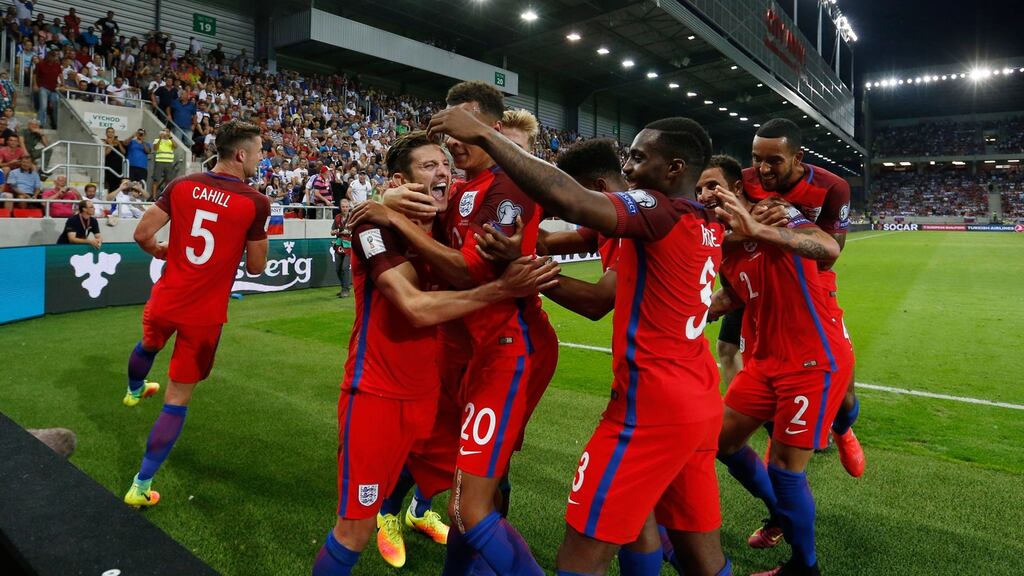 England’s Adam Lallana celebrates scoring the winning goal in their 2018 World Cup qualifying match with Slovakia. Photo: Carl Recine/Reuters