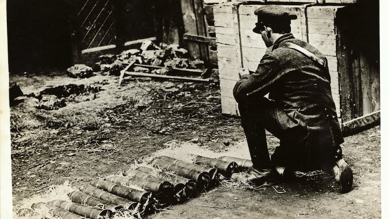 A Free State soldier prepares shells for one of the eighteen punders to use against the republican forces in the Four Courts. Photograph: George Rinhart/Corbis via Getty Images