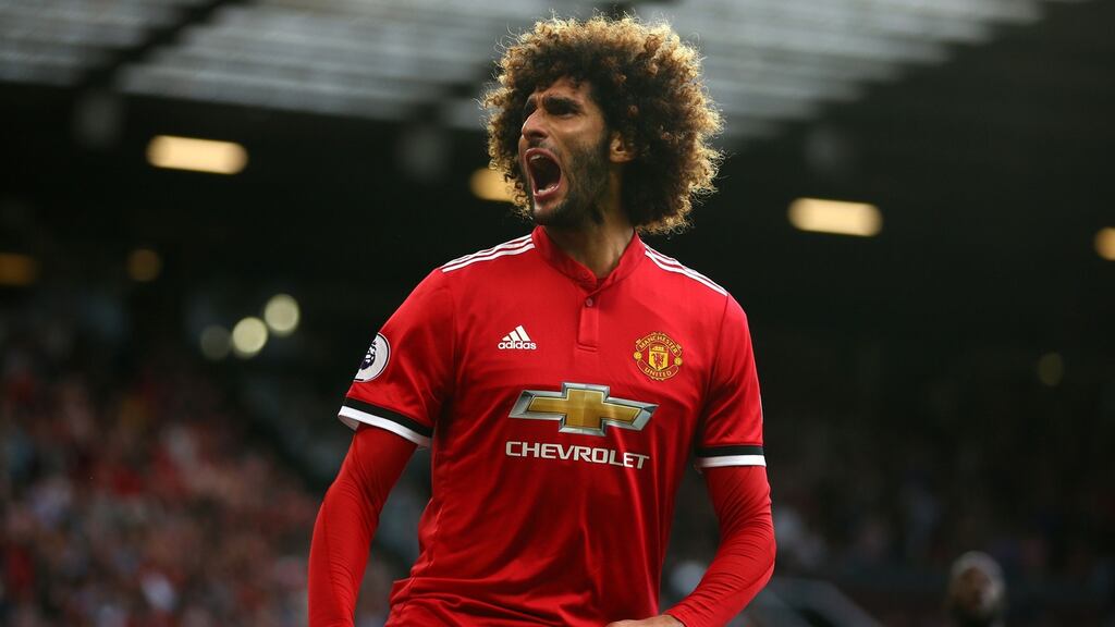 Manchester United’s Marouane Fellaini celebrates scoring his side’s second goal during the Premier League match against Leicester City at Old Trafford. Photograph: Dave Thompson/PA Wire