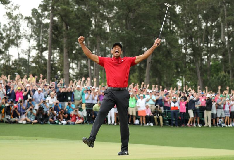 Tiger Woods celebrates on the 18th hole having sunk his last putt to win the 2019 US Masters. Photgraph: Lucy Nicholson/Reuters
