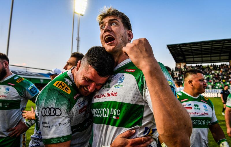 Benetton’s Sebastian Negri and Federico Ruzza celebrate the victory over Glasgow Warriors at Stadio Monigo in Treviso. Photograph: Luca Signolfi/Inpho