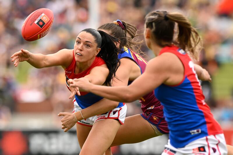 Sinéad Goldrick of the Demons handballs under pressure during the AFLW Grand Final match between the Brisbane Lions and the Melbourne Demons. Photograph: Matt Roberts/AFL Photos/Getty Images