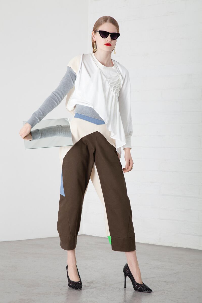 Ruched top €190, panelled trouser with neon trim €195, braided stilettoes Zara €55.95, brass earring Soko Atrium €79, sunglasses Om Diva €32, ring €89 Soko, Atrium