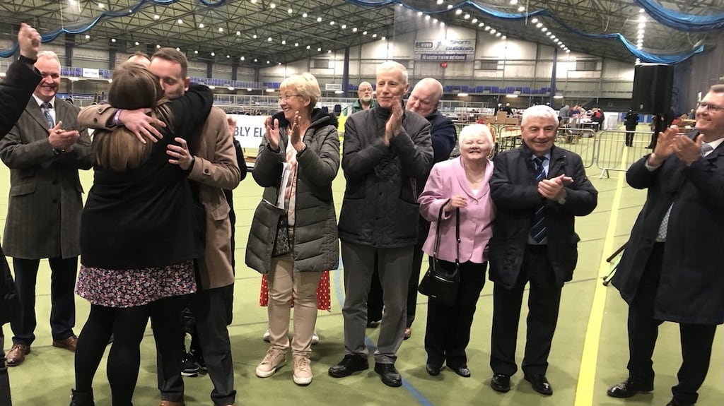 Gary Middleton (DUP, third from left) surrounded by well-wishers after 1am on Sunday after being elected on the 13th count in Foyle in the Northern Ireland Assembly elections. Photograph: Brian Hutton