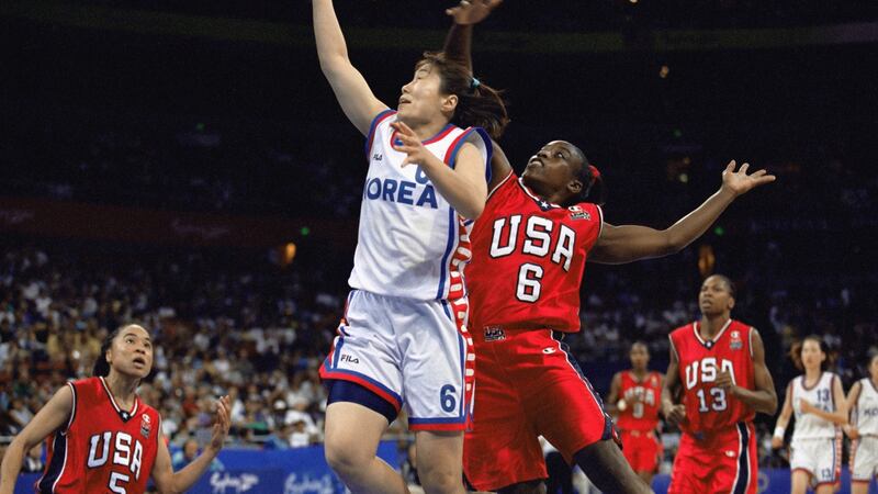 Ji-Yoon Kim of South Korea shoots past Ruthie Bolton during the 2000 Sydney Summer Olympics. Photograph: Jed Jacobsohn/Getty