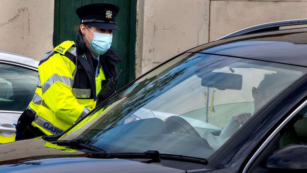 A garda at a checkpoint. By the end of 2021 the Garda force is set to expand to 15,000 sworn members. Photograph: Liam McBurney/PA Wire