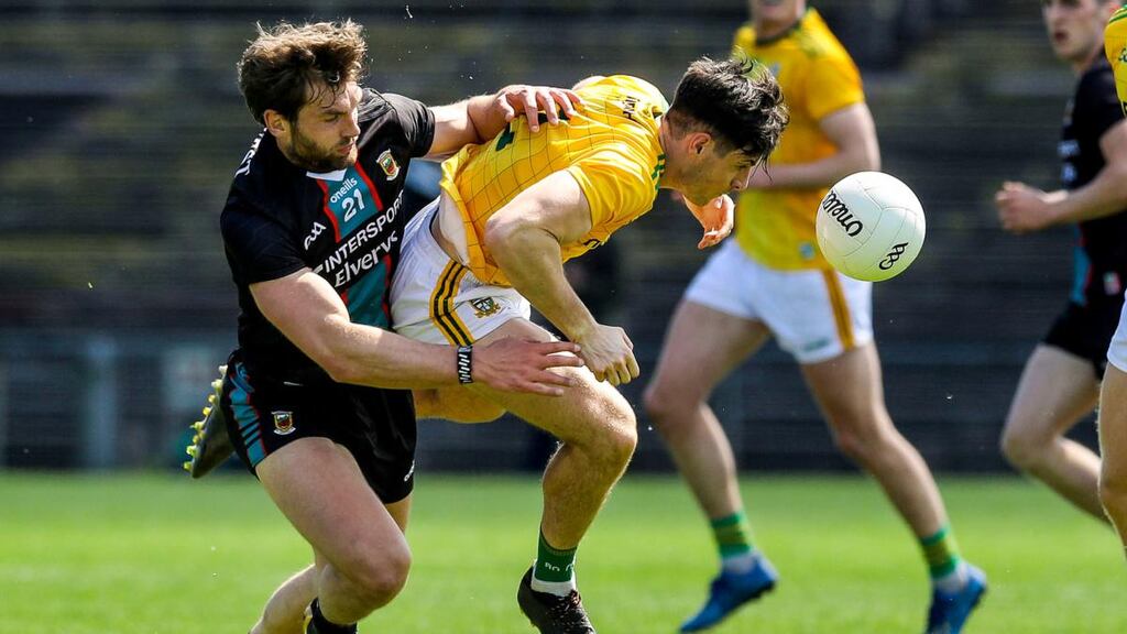 Aidan O’Shea tackles Seamus Lavin during Mayo’s win over Meath in Castlebar. Photograph: Lorraine O’Sullivan/Inpho