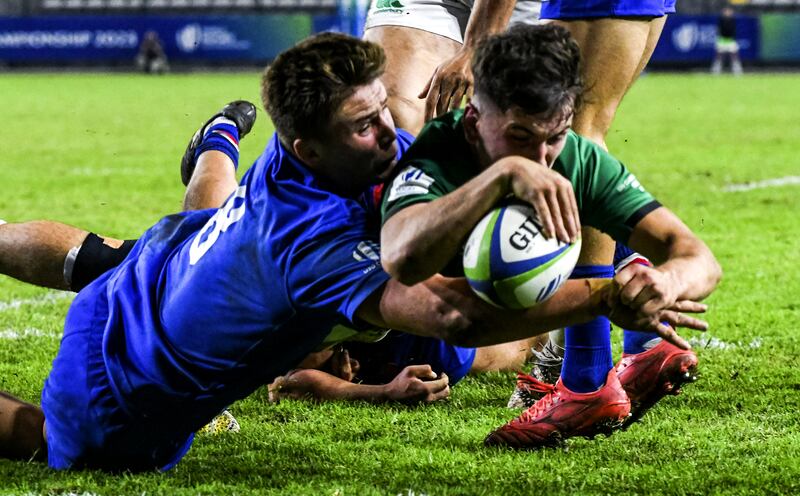 Ireland’s John Devine scores his team's second try against France. Photograph: Darren Stewart/Inpho