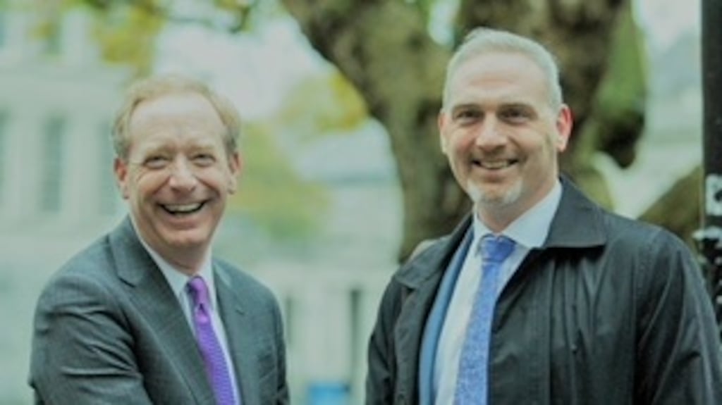 Brad Smith, chief legal officer of Microsoft, with Ciarán Conlon