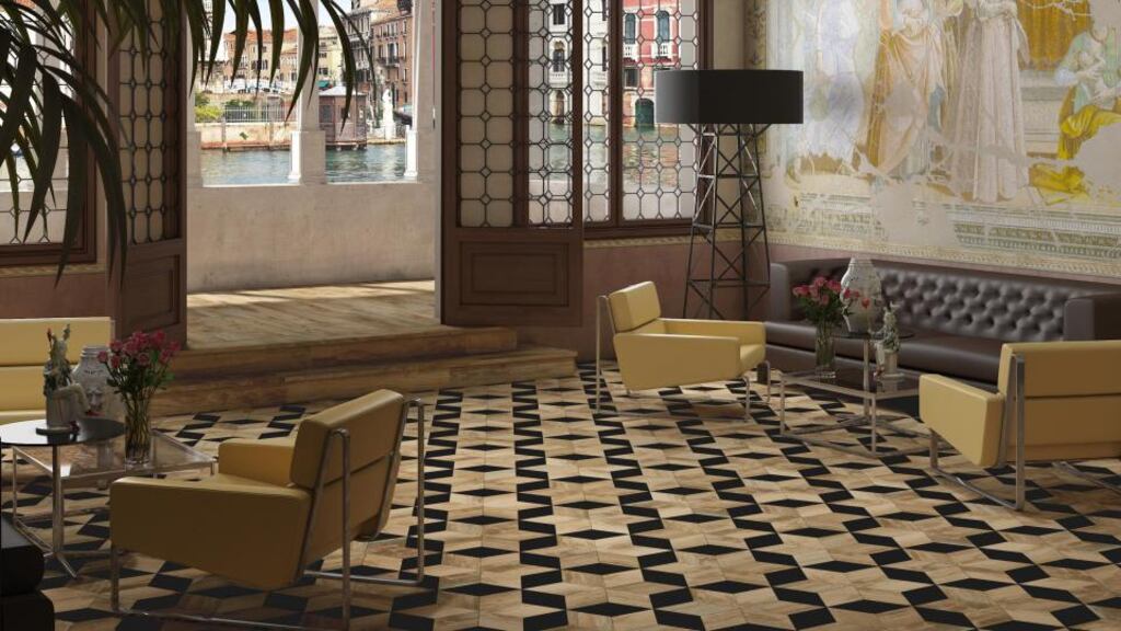 This parquet effect flooring is made of porcelain not wood and works really well when used with underfloor heating