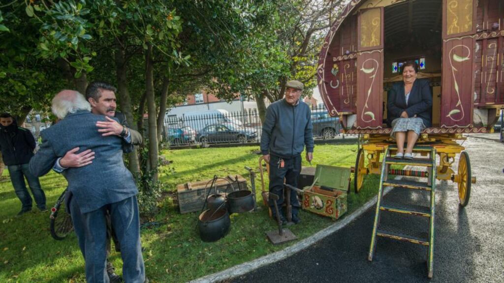 President Michael D Higgins: During his visit to Pavee Point Traveller and Roma Centre he meets Martin Collins, James Collins and Molly Collins. Photograph: Brenda Fitzsimons