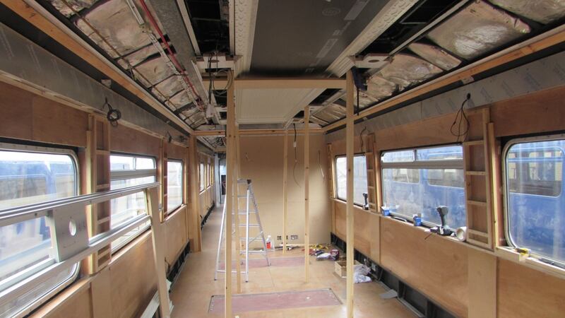 The massive factory in Antrim can scarcely contain the 23-metre carriages as craftsmen work to exacting standards to have them ready for the first guests on August 9