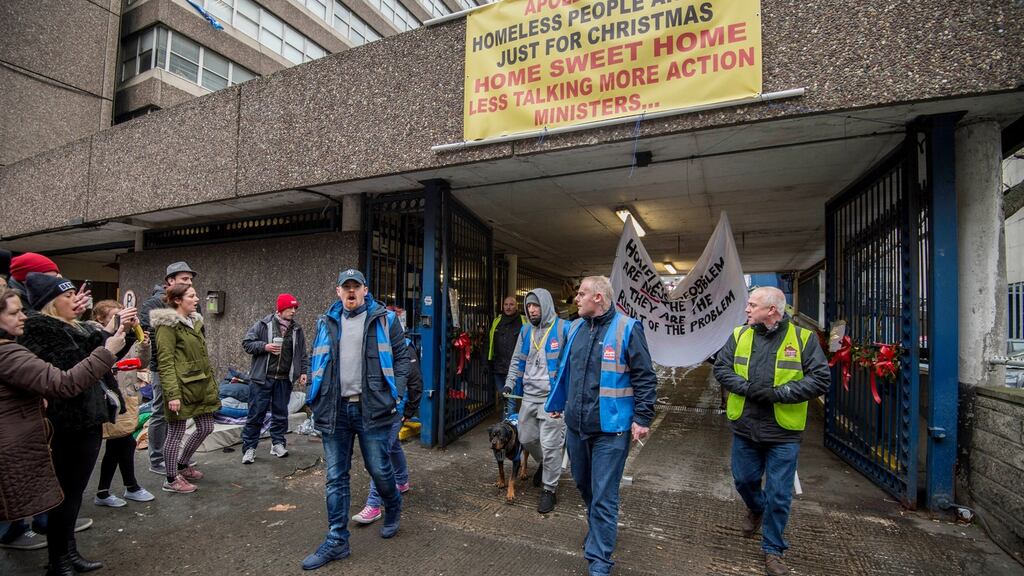 Volunteers vacating Apollo House after homeless occupants had voluntarly left the building. Photograph: Brenda Fitzsimons / THE IRISH TIMES