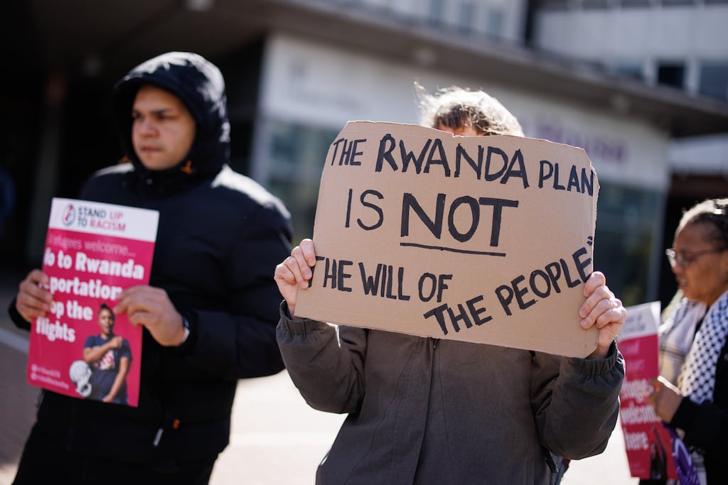 Campaigners protest against the British government's Rwanda deportation scheme outside a home office immigration reporting centre in Croydon, south London. Photograph: EPA/European Pressphoto Agency