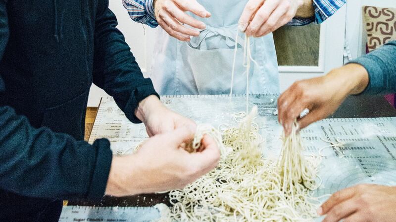 Making ramen noodles from scratch at an Airbnb private house cookery class in San Francisco