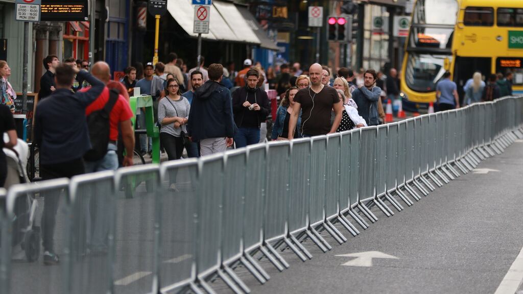 The first Sunday  College Green was closed to traffic and converted into a plaza with crowd control barriers along Dame Street. Photograph Nick Bradshaw
