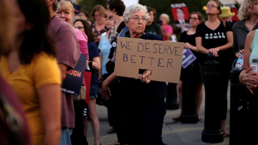 Charlotte Peterson of Woodbridge, Virginia demonstrates outside the US supreme court during a vigil in opposition to supreme court nominee Brett Kavanaugh in Washington on Wednesday. Photograph: James Lawler Duggan/Reuters