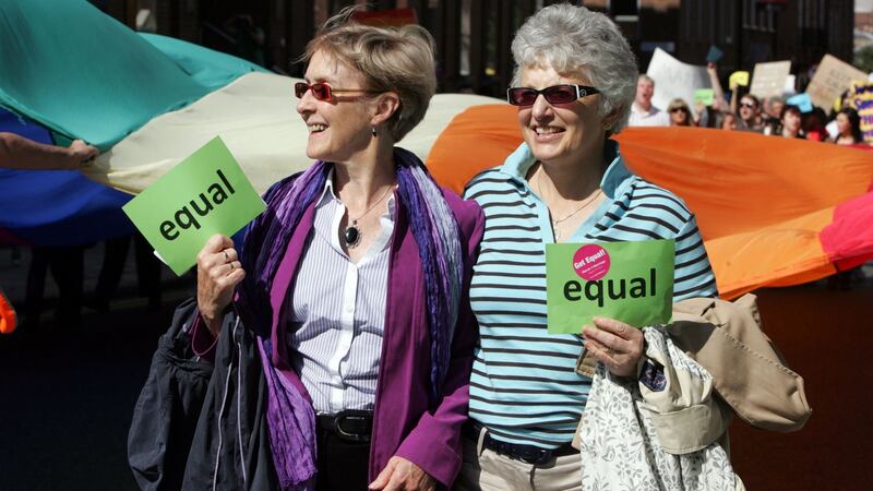 The late Dr Ann Louise Gilligan, left, and her wife Katherine Zappone, Minister for Children and Youth Affairs, at the march to the Department of Justice for marriage equality in 2011. Photograph: Cyril Byrne