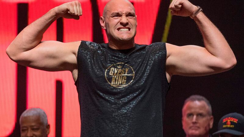 Tyron Fury takes on Deontay Wilder in their Las vegas rematch weighing in at 273lbs. Photograph: Mark Ralston/Getty/AFP