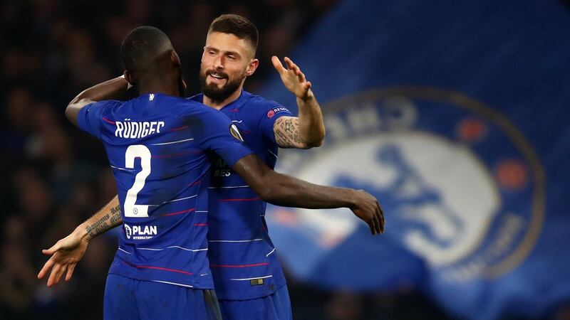 Chelsea striker Olivier Giroud celebrates after scoring the opening goal with Antonio Rüdiger during the Europa League round of 32 second leg match against Malmö at Stamford Bridge. Photograph: Julian Finney/Getty Images