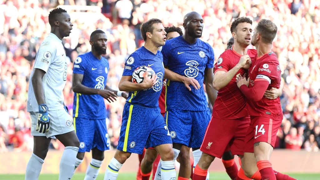 Chelsea and Liverpool players clash after Mo Salah had converted from the penalty spot after Reece James was sent off for handball. Photograph: Michael Regan/Getty Images