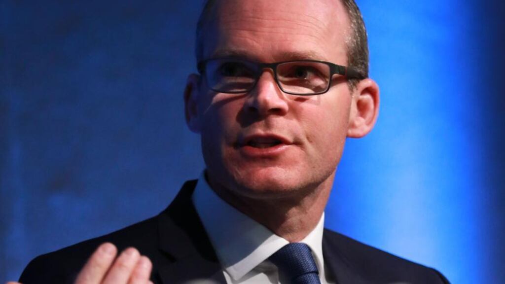 Simon Coveney: said he was putting a lot of people under pressure to deliver. Photograph: Nick Bradshaw