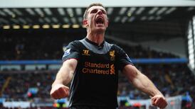 Gerrard penalty secures points for Liverpool