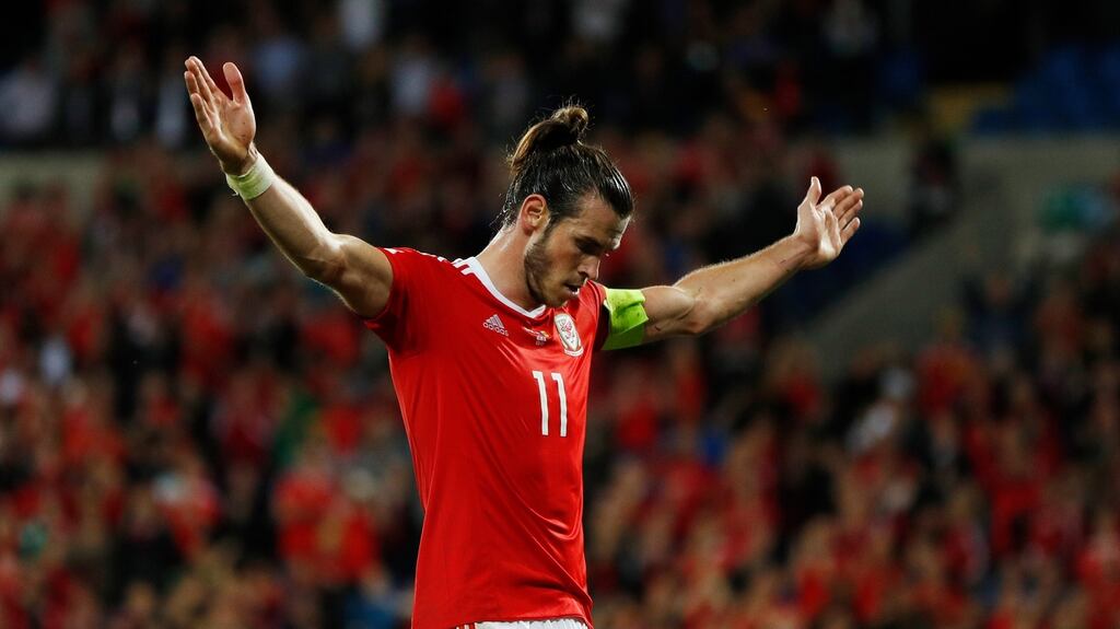 Gareth Bale scored twice as Wales thrashed Moldova 4-0 in their opening World Cup qualification match. Photograph: Reuters
