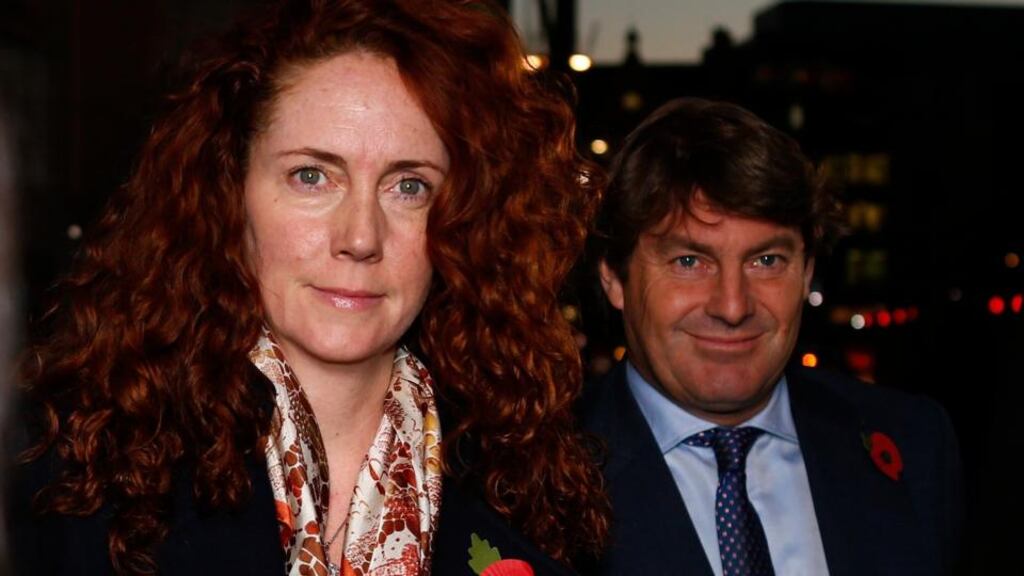 Rebekah Brooks and her husband Charlie leave the Old Bailey  in London yesterday. The court heard that on July 17th, 2011, the day Ms Brooks was first arrested, her husband had been recorded on CCTV hiding a bag and a laptop beside bins in the underground car park of their London flat. Photograph: Andrew Winning/Reuters