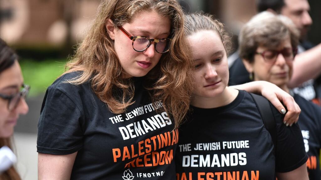 Demonstrators mourn the deaths of Palestinian demonstrators as they rally before marching to the Trump International Hotel in Washington, DC. Photograph:  Mandel Ngan/AFP/Getty Images