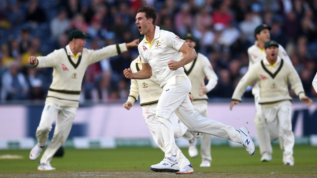 Pat Cummins celebrates dismissing England captain Joe Root. Photograph: Gareth Copley/Getty Images