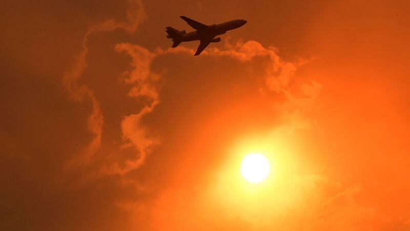 A DC-10 Air Tanker makes a pass to drop fire retardant on a bushfire in North Nowra, south of Sydney on Saturday. Photograph: Mick Tsikas/AAP/Reuters