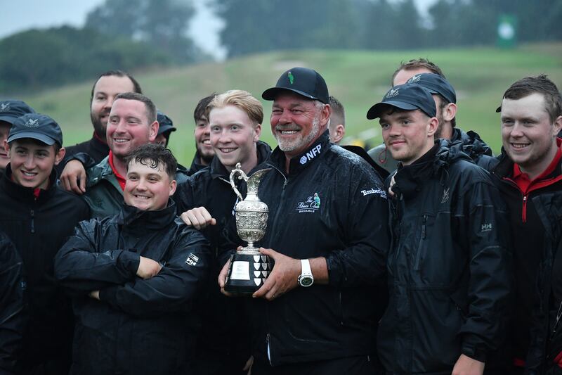 Darren Clarke with the trophy and the greenkeepers after his victory in last year's Senior Open at Gleneagles Auchterarder, Scotland. Photograph: Mark Runnacles/Getty Images