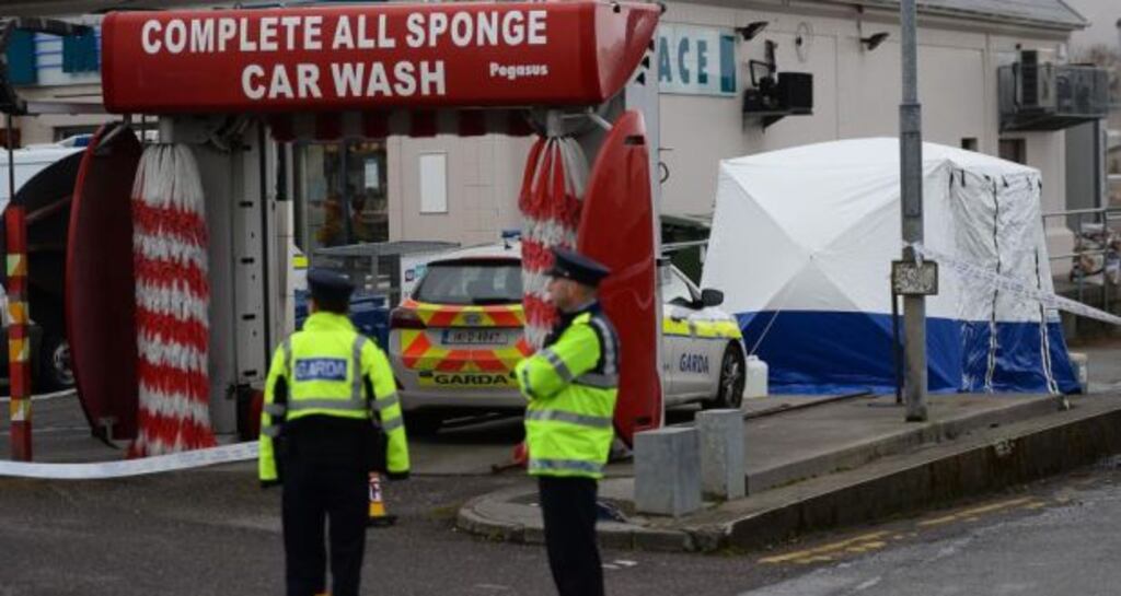 Gardaí at Kellihers Garage in Tralee, Co Kerry, where the body of 42-year-old Nigel Leigh was discovered on Friday, April 3rd. Photograph: Domnick Walsh
